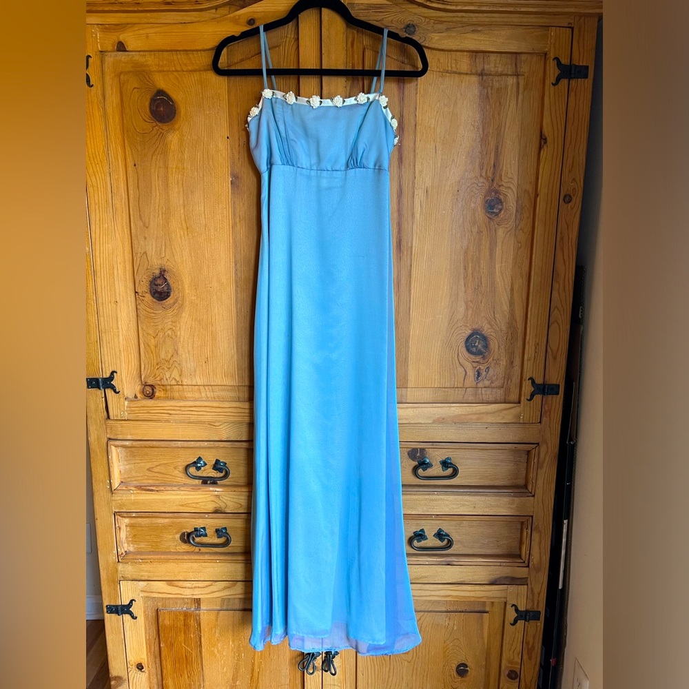 Shimmery powder blue dress by Ellie; size is Small but it fits a 00P woman.